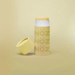 Load image into Gallery viewer, Reef safe, cruelty-free neon yellow Nöz sunscreen in a light yellow background
